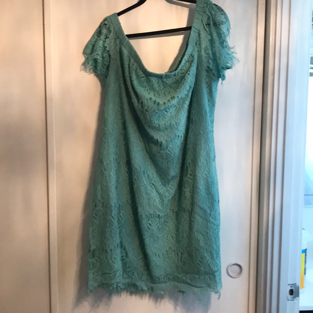 Plus size off the shoulder lace dress.